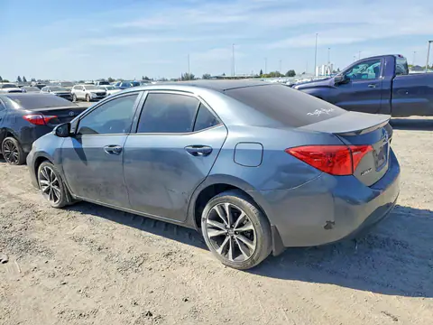 2T1BURHE1JC984784 — 2018 Toyota Corolla, zdjęcie 2 z Copart 20.10.2026, Bok