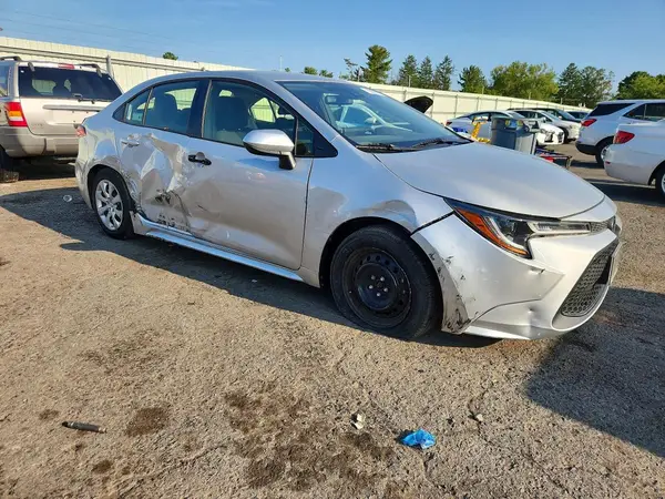 JTDEPMAE2MJ187454 — 2021 Toyota Corolla, photo 4 from Copart, Side