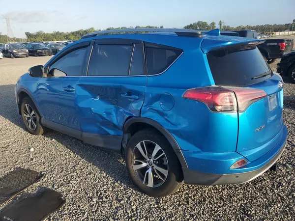 JTMWFREV9JD113988 — 2018 Toyota RAV4, фото 2 с аукциона Copart, Боковая часть