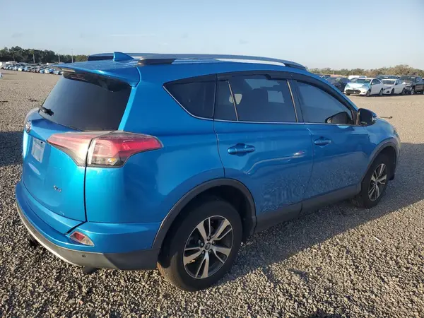 JTMWFREV9JD113988 — 2018 Toyota RAV4, фото 3 с аукциона Copart, Боковая часть