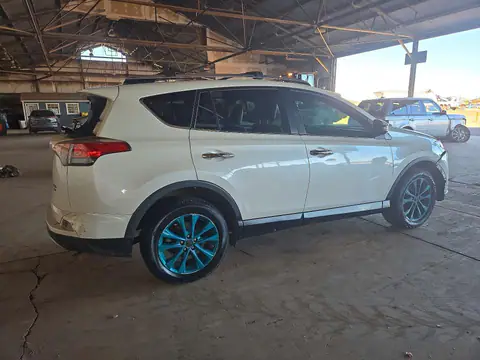 JTMDFREV2JJ733879 — 2018 Toyota RAV4, zdjęcie 3 z Copart 26.10.2026, Tył