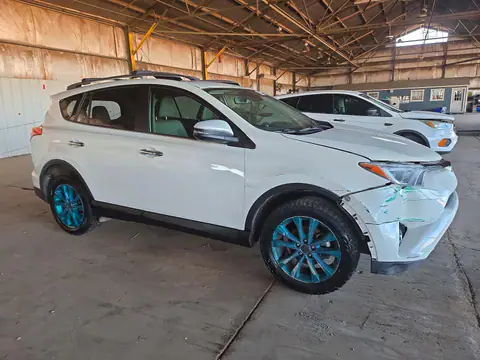JTMDFREV2JJ733879 — 2018 Toyota RAV4, zdjęcie 4 z Copart 26.10.2026, Tył