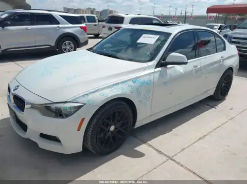 WBA8B9G30HNU52009 — 2017 BMW 3ER, photo 2 from IAAI, Hail