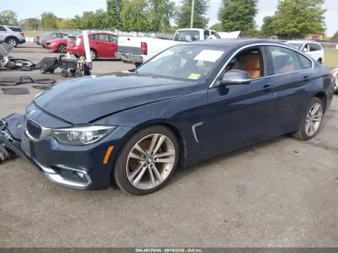 WBA4J3C52KBL09335 — 2019 BMW 4ER, фото 2 з IAAI, Передня частина справа