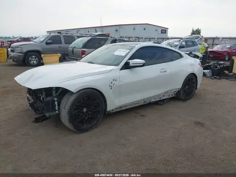 WBS53AZ02MCF90093 — 2021 BMW M4, фото 2 з IAAI 26.10.2026, Передня й задня частини