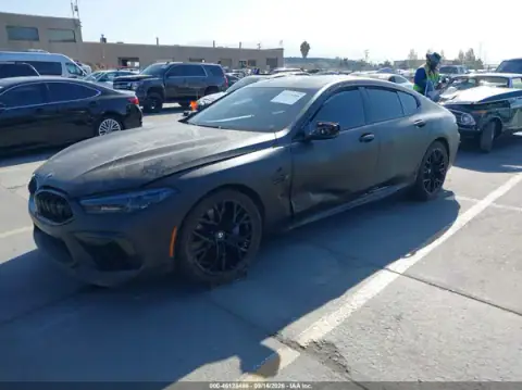 WBSGV0C02MCF96904 — 2021 BMW M8, photo 2 from IAAI, Left side