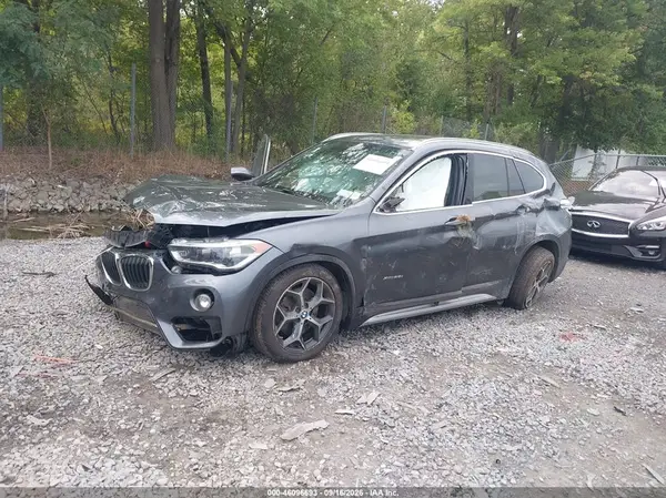 WBXHT3C39GP885871 — 2016 BMW X1, фото 2 с аукциона IAAI 13.10.2026, Повреждения со всех сторон