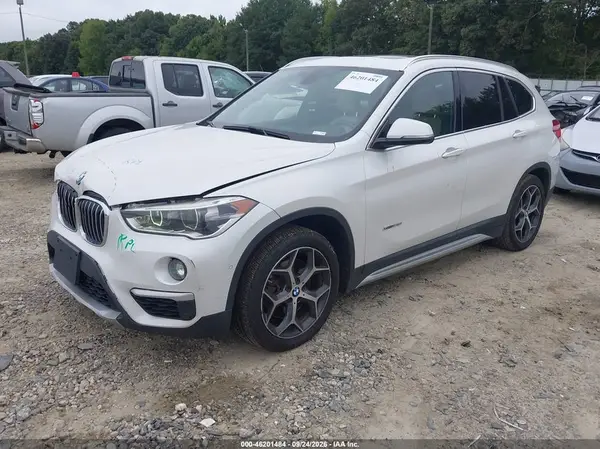 WBXHT3C34GP880819 — 2016 BMW X1, фото 2 с аукциона IAAI, Передняя часть