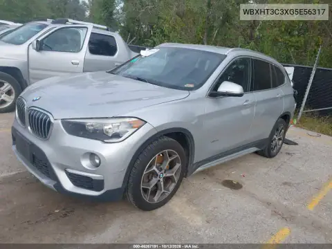 WBXHT3C3XG5E56317 — 2016 BMW X1, zdjęcie 3 z IAAI, Tył