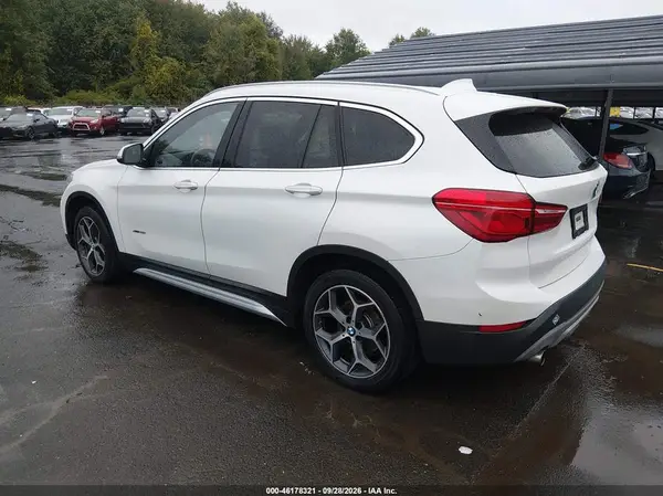 WBXHT3C39J5K27082 — 2018 BMW X1, photo 3 from IAAI, Flood