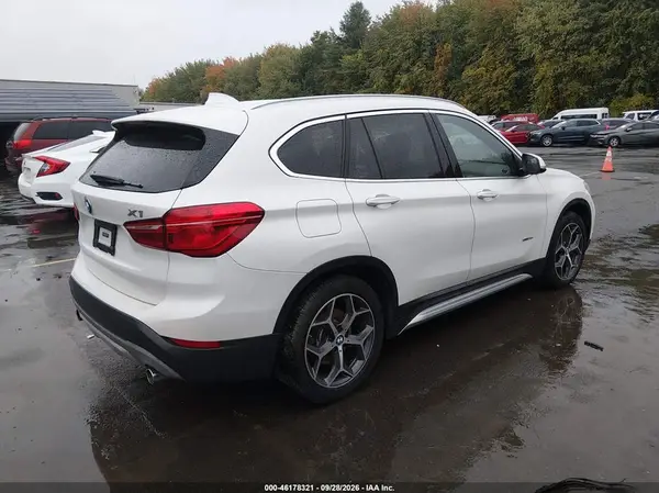 WBXHT3C39J5K27082 — 2018 BMW X1, photo 4 from IAAI, Flood
