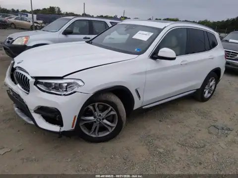 5UXTY5C09M9E30112 — 2021 BMW X3, photo 2 from IAAI, Right front