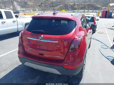KL4CJASB1JB699041 — 2018 Buick Encore, photo 4 from IAAI, Left side