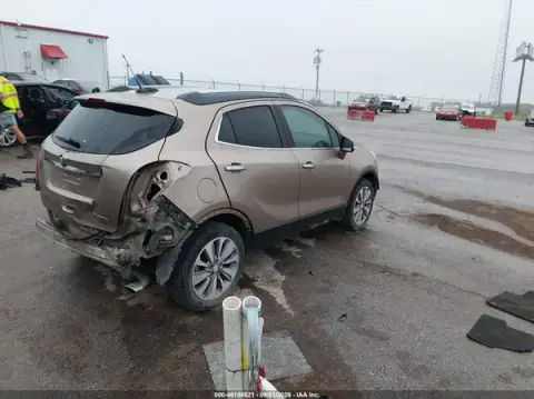 KL4CJASB9KB909774 — 2019 Buick Encore, photo 4 from IAAI, Front and rear