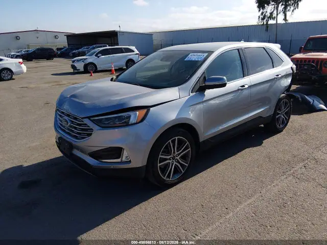 2FMPK4K96RBA19557 — 2024 Ford Edge Titanium, photo 2 from IAAI 28.09.2026, Left rear
