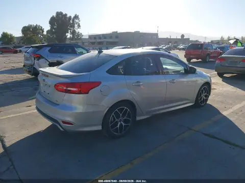 2015 Ford FOCUS SE VIN 1FADP3F26FL249097 фото 4