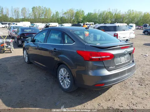 2016 Ford Focus Titanium VIN 1FADP3J24GL341690 фото 3
