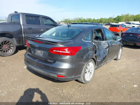 2016 Ford Focus Titanium VIN 1FADP3J24GL341690 фото 4