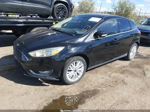2016 Ford Focus Titanium VIN 1FADP3N22GL394964 фото 2