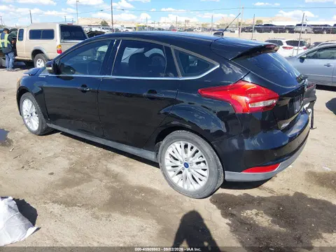 2016 Ford Focus Titanium VIN 1FADP3N22GL394964 фото 3