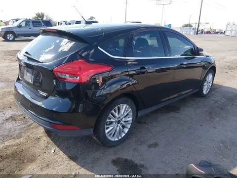 2016 Ford Focus Titanium VIN 1FADP3N22GL394964 фото 4