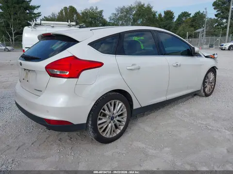2016 Ford Focus Titanium VIN 1FADP3N23GL307945 фото 4