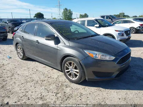 2016 Ford Focus VIN 1FADP3F23GL323139 фото 1