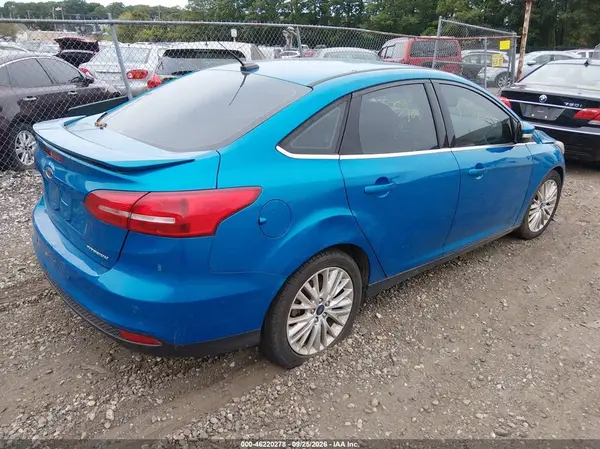 1FADP3J2XGL274688 — 2016 Ford Focus, фото 4 с аукциона IAAI, Левый и правый бока