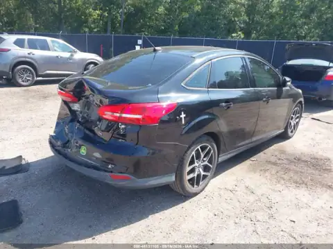 1FADP3H24JL284422 — 2018 Ford Focus, photo 4 from IAAI 21.10.2026, Rear end