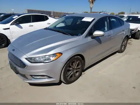 3FA6P0G74HR215357 — 2017 Ford Fusion, photo 2 from IAAI, Rear end