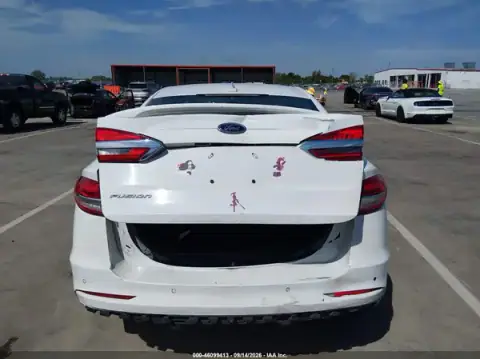 3FA6P0H79LR129128 — 2020 Ford Fusion, photo 4 from IAAI, Rear end