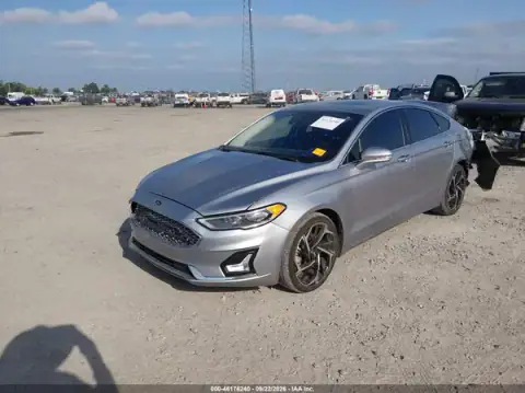 3FA6P0D99LR194181 — 2020 Ford Fusion, foto 2 de IAAI, Parte delantera y trasera
