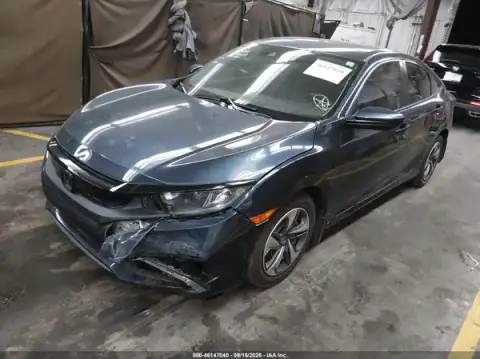 2HGFC2F65MH530721 — 2021 Honda Civic, foto 2 de IAAI, Delantera izquierda