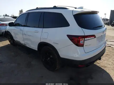 5FNYF6H78MB057821 — 2021 Honda Pilot, photo 3 from IAAI, Left side