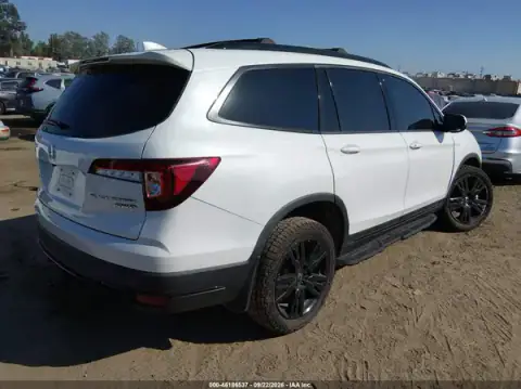 5FNYF6H78MB057821 — 2021 Honda Pilot, photo 4 from IAAI, Left side