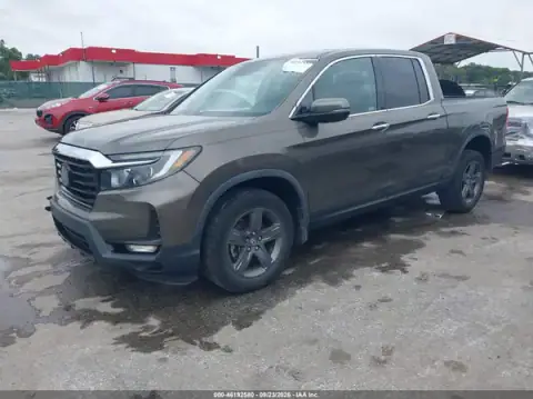 5FPYK3F74PB018006 — 2023 Honda Ridgeline, zdjęcie 2 z IAAI, Przód