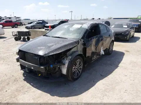3KPF54AD4RE754754 — 2024 Kia Forte, photo 2 from IAAI, Left side