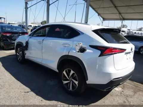JTJGARBZ6M5031013 — 2021 Lexus NX, photo 3 from IAAI, Left side