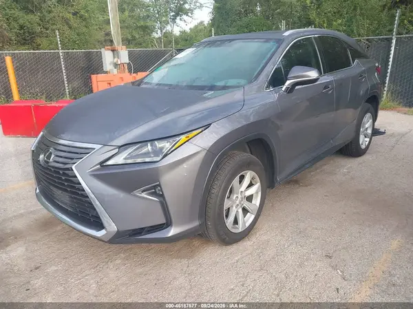 2T2BZMCA3GC026114 — 2016 Lexus RX, photo 2 from IAAI 12.10.2026, Hail