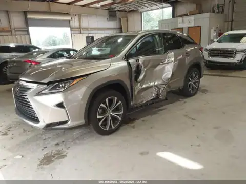 2T2ZZMCA7HC047581 — 2017 Lexus RX, zdjęcie 2 z IAAI, Lewy bok