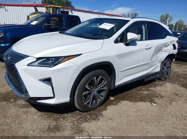 JTJBZMCAXJ2036680 — 2018 Lexus RX, photo 2 from IAAI, Left side