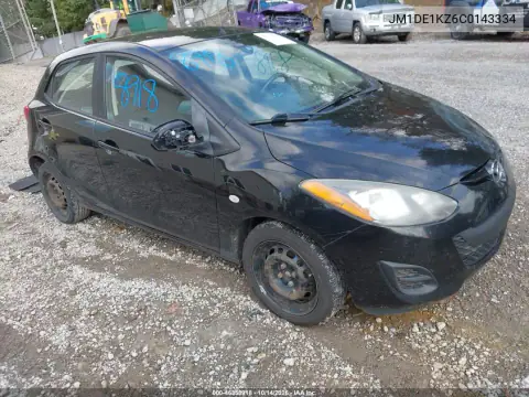 JM1DE1KZ6C0143334 — 2012 Mazda 2, Передняя часть, фото до ремонта