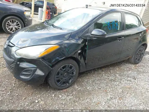 JM1DE1KZ6C0143334 — 2012 Mazda 2, photo 3 from IAAI, Front end