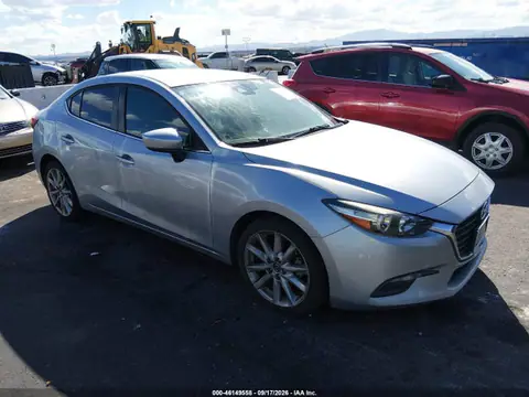 JM1BN1V77H1100737 — 2017 Mazda 3, Interior fire (Interior Burn), before-repair photos