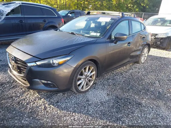 JM1BN1M35H1144363 — 2017 Mazda 3, photo 2 from IAAI 13.10.2026, Left side