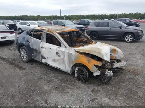 JM1BPAAL8T1864702 Mazda 3 2026 — Complete burn damage, before-repair photo