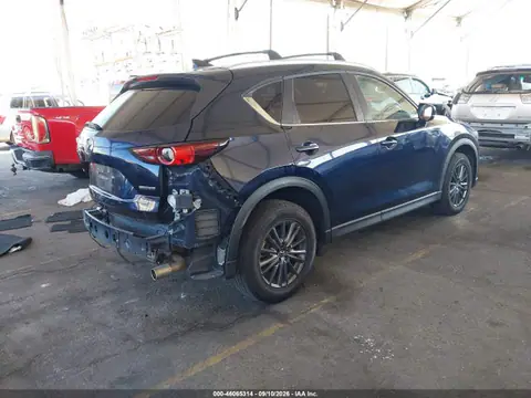 JM3KFACMXM1312300 — 2021 Mazda CX-5 Touring, фото 4 з IAAI 20.10.2026, Задня частина