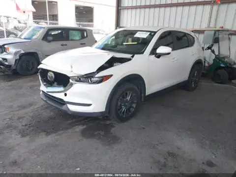 JM3KFACMXM1332112 — 2021 Mazda CX-5, photo 2 from IAAI, Front end