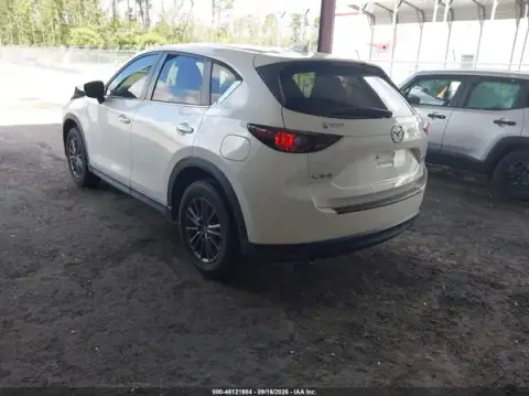 JM3KFACMXM1332112 — 2021 Mazda CX-5, photo 3 from IAAI, Front end