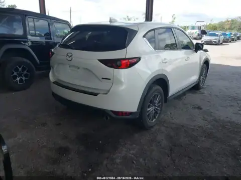 JM3KFACMXM1332112 — 2021 Mazda CX-5, photo 4 from IAAI, Front end